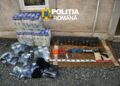 Percheziții la Arad. Polițiștii au găsit o armă, muniție și produse susceptibile a fi contrafăcute